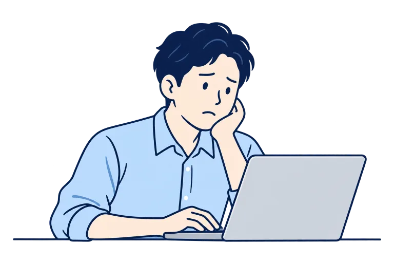 パソコンの前でサイトの状態を気にしている担当者
